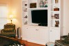 White bookcase and entertainment center