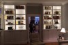 Twin bookcases with lit shelving